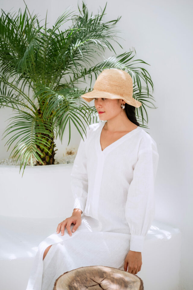 model sitting linen dress